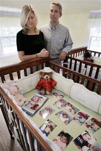 Baby-Stealing Charges Halt Adoptions