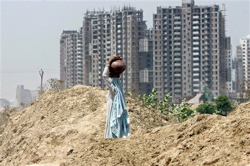 Gated Enclaves Soar Above Indian Slums