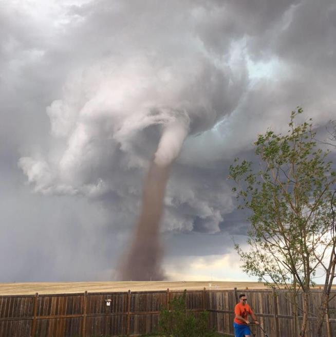 Yes, That's a Tornado in This Lawnmowing Photo