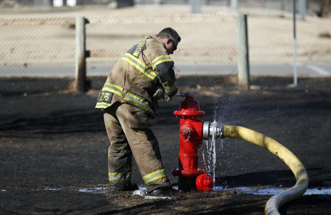 Cops: Guy Fled Accident—With Fire Hydrant