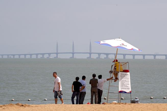 China Opens World's Longest Sea Bridge