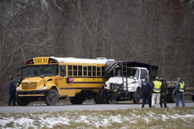 Student Killed When Truck Rear-Ends School Bus
