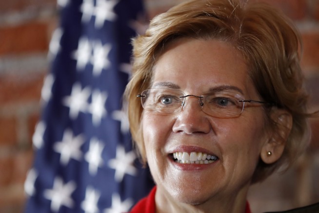 Sen. Elizabeth Warren speaks to local residents during an organizing event
