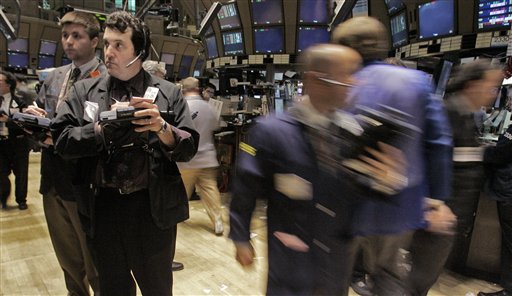 Stocks Mixed; Commodities Fall