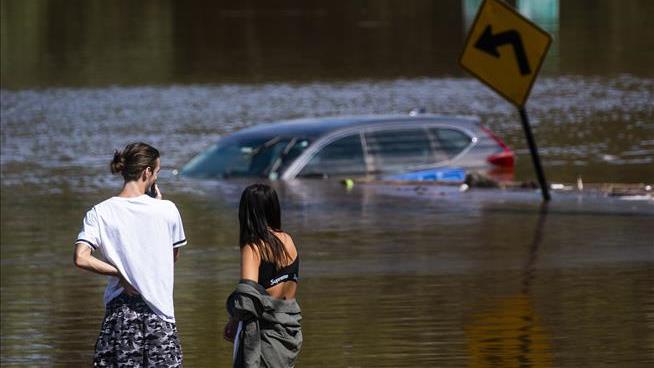 As Many As 8 Killed In Floods Were Trapped In Their Cars