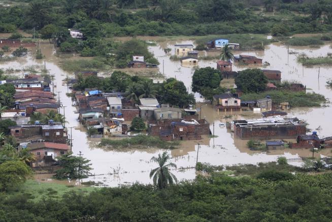 Floods Kill 91, With 26 More Missing