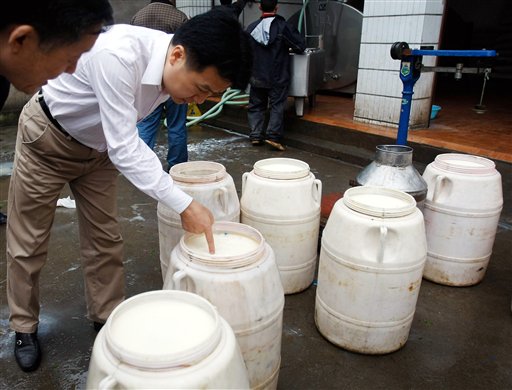Six Busted in China Milk Scandal