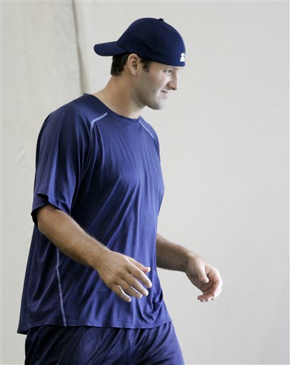 Romo Aims to Play On With Broken Finger