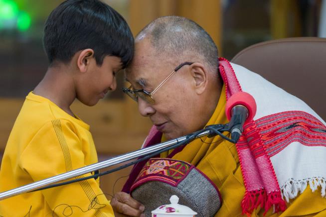Dalai Lama Apologizes Over His Greeting of Young Boy