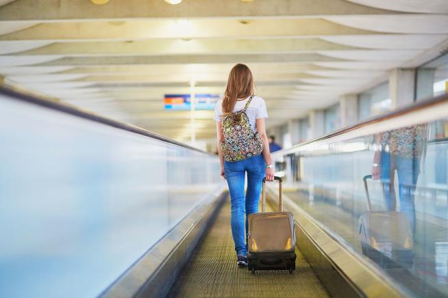Woman Loses Leg on Airport's Moving Walkway