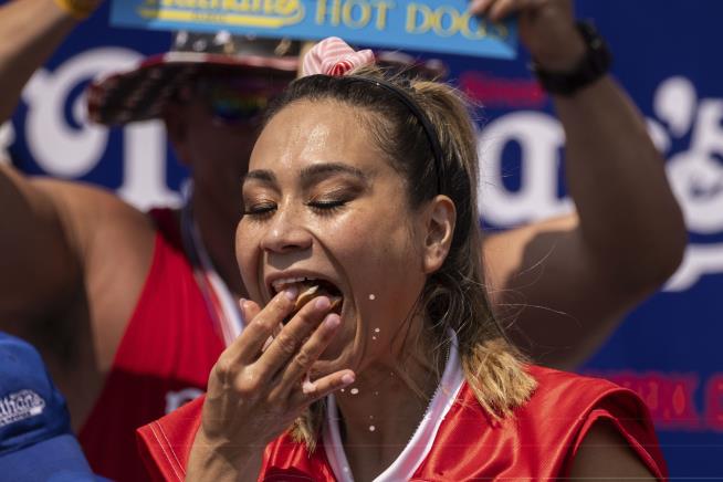 Champs Defend Titles at Hot Dog Eating Contest