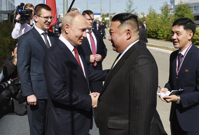 Vladimir Putin, Kim Jong Un Shake Hands