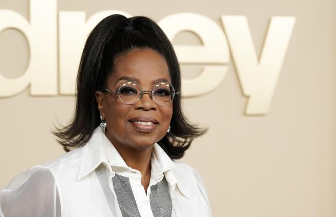 Book: Oprah Asked Romney to Run With Her in 2020