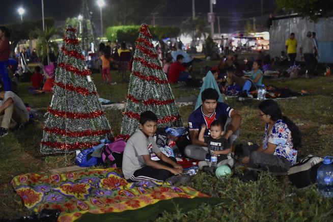 On a 'Sad' Christmas, Migrants Keep Moving