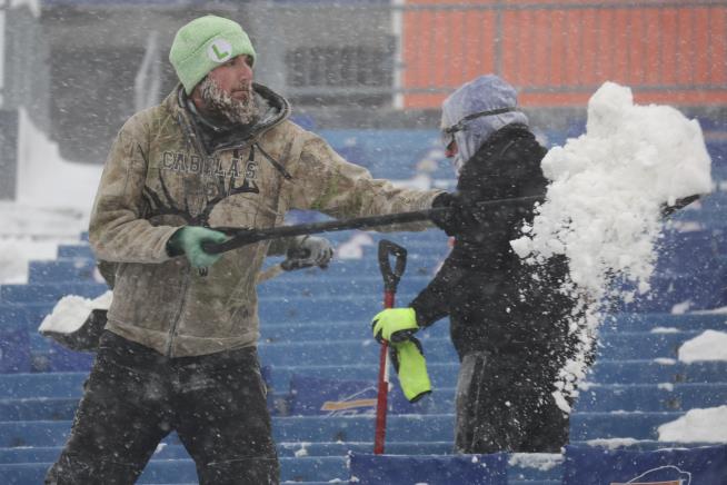 Bills Fans Get Paid to Dig Out Stadium
