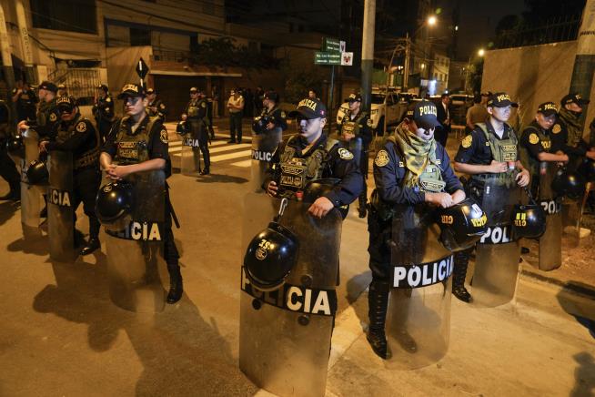 Cops Break Down Peru President's Door