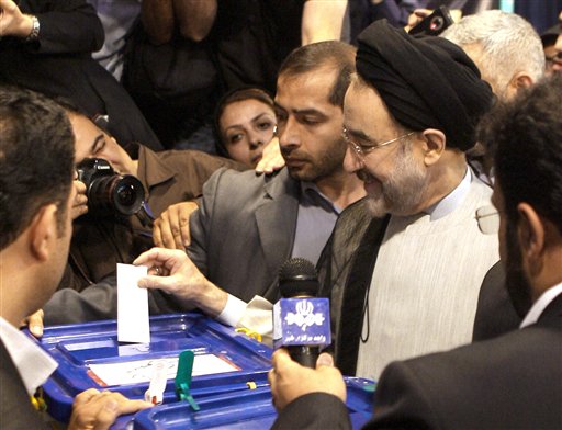 Ahmadinejad, Chief Rival Both Claim Victory