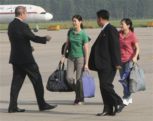 Freed Journalists On Way Home From North Korea
