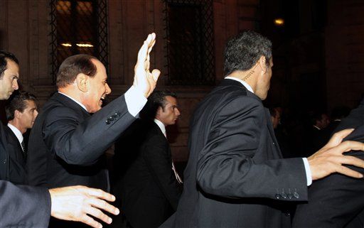 Berlusconi: I'm Not Going Anywhere
