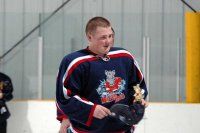 High School Hockey Player Sinks to Ice, Dies