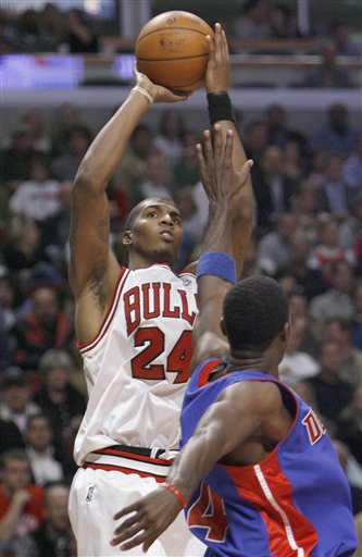 Bulls Hang On, Beat Pistons for First Win