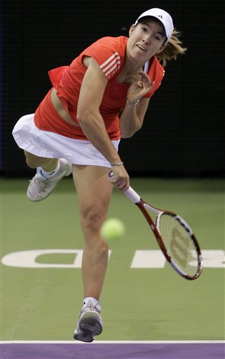 Henin Outlasts Sharapova in Record Match