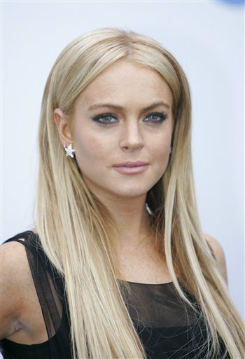 Lohan Arrested in DUI After Hitting Curb