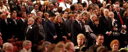 Romney Skips Trail to Grieve Mormon Leader