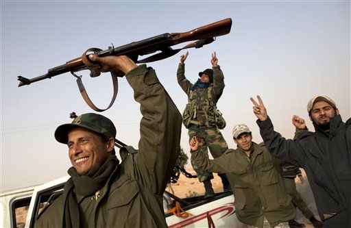 Libya Protests: Rebels Advance Toward Sirte, Moammar Gadhafi's Hometown, as NATO Announces it Will Assume Aerial Command