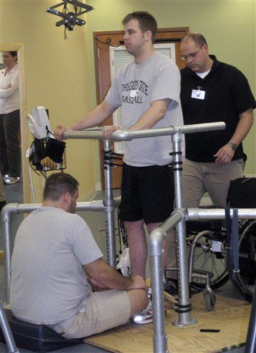 Paraplegic Walks With Electrode Treatment
