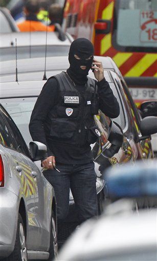 French Suspect Says He'll Surrender