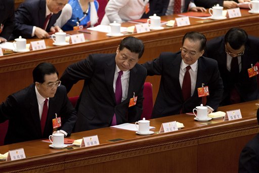 As China Wraps Transition, Xi Vows to Clean Up Govt.