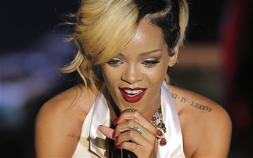 Rihanna Poses With Rare Critter, Arrests Ensue