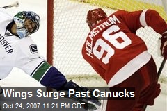 Wings Surge Past Canucks
