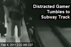 Distracted Boy Gamer Tumbles to Subway Track