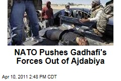 Libya: NATO Airstrikes Push Moammar Gadhafi's Forces Out of Ajdabiya, Also Hit Government Tanks in Misrata