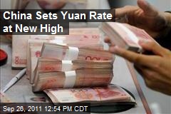 China Sets Yuan Rate at New High
