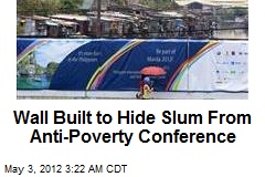 Wall Built to Hide Slum From Anti-Poverty Conference