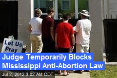 Judge Temporarily Blocks Mississippi Anti-Abortion Law