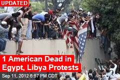 Egyptian Protesters Scale US Embassy, Destroy Flag