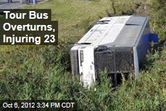 Tour Bus Overturns, Injuring 23