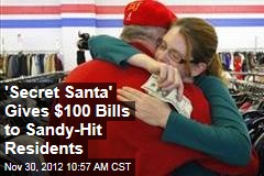 &#39;Secret Santa&#39; Gives $100 Bills to Sandy-Hit Residents
