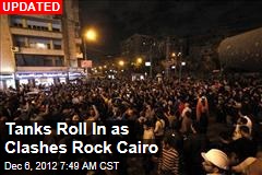 Tens of Thousands Clash in Cairo