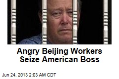 Angry Beijing Workers Seize American Boss