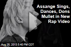Assange Sings, Dances, Dons Mullet in New Rap Video