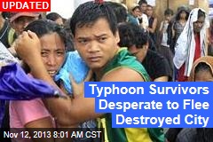 Typhoon Survivors Desperate to Flee Destroyed City