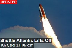 Shuttle Atlantis Lifts Off