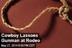 Cowboy Lassoes Gunman at Rodeo