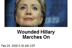 Wounded Hillary Marches On