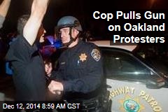 Cop Pulls Gun on Oakland Protesters